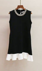 Chic Black Mini Dress with Pearl Collar & Ruffle Hem