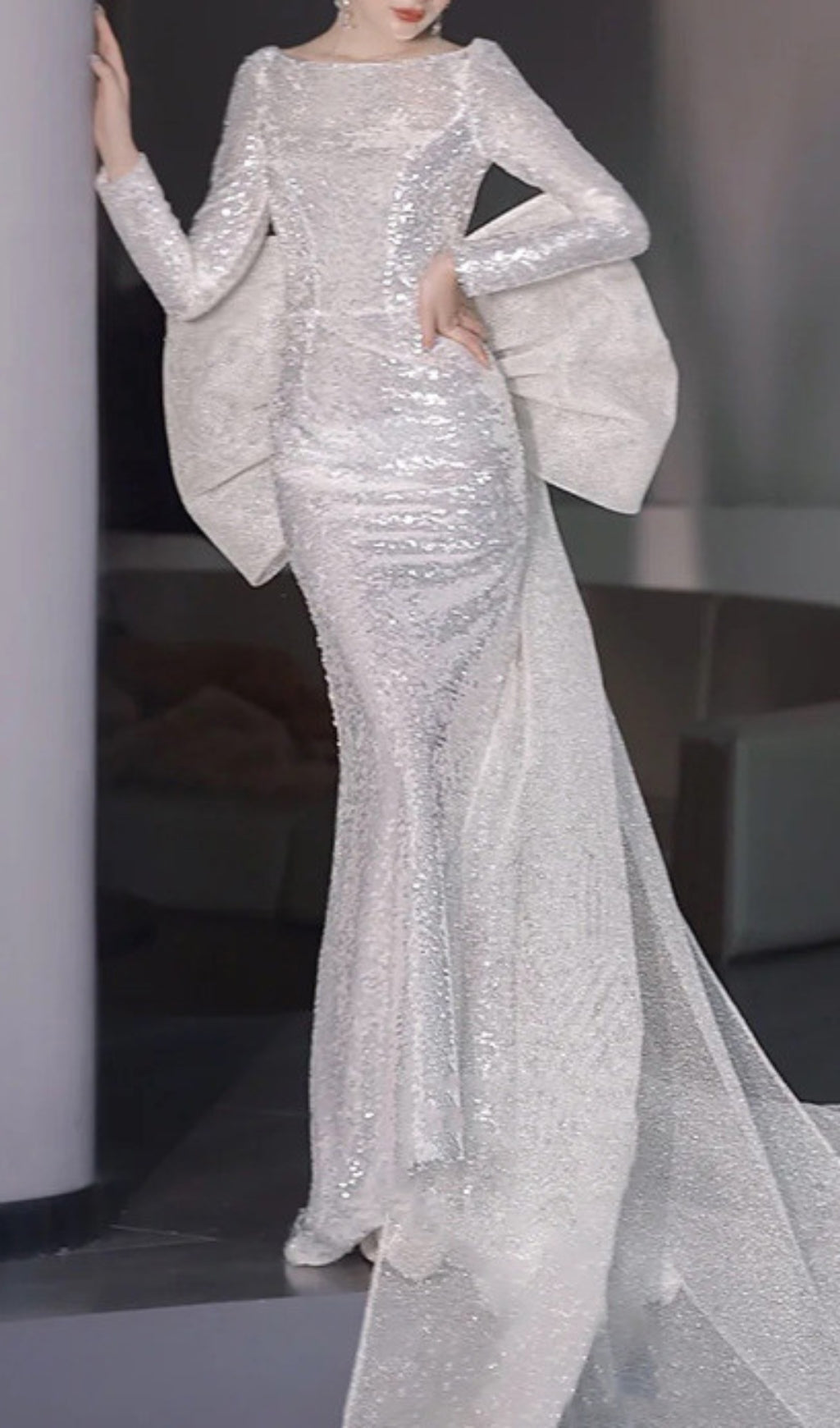 Cyma Glamorous Sequin Mermaid Gown with Dramatic Bow & Long Sleeves