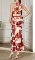 Eshe Chic Abstract Halter Maxi Dress with Glam Cutout & Slit