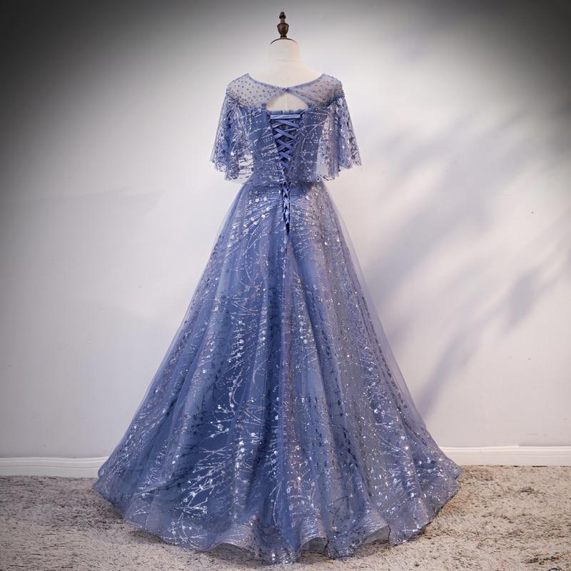 Vestido de noche largo con cordones y hombros descubiertos en azul glamuroso 