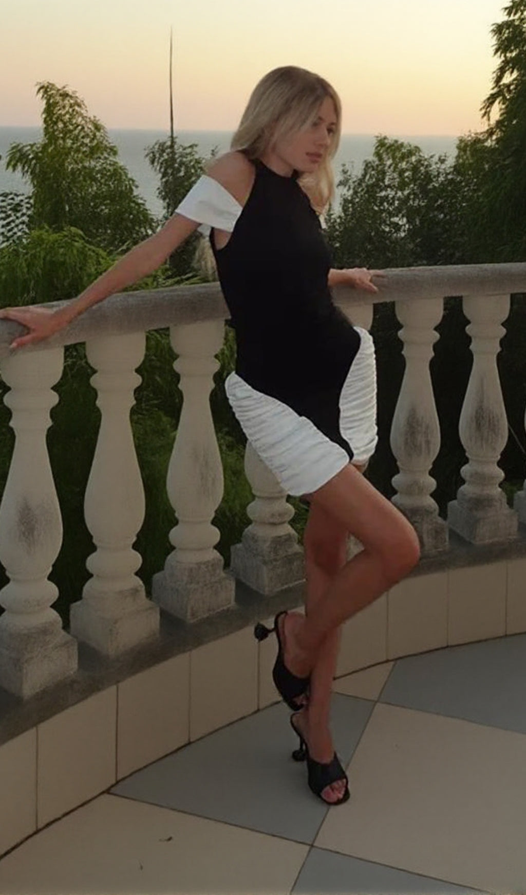 Chic Black & White Ruched Panel Halter Mini Dress
